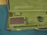 6168 Winchester 101 or 23 or other shotgun case, luggage style 1971-1987 hs the original keys,99% condition, leather trim, will take 28 inch barrels - 3 of 4