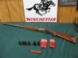 6176 Winchester 101 Pigeon XTR 12 gauge, 28 inch barrels, 6 winchester chokes, 2ic 2mod 2 full, wrench, 2 winchester pouches, freckled right side of r - 1 of 11