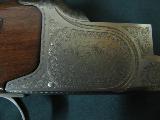 6188 Winchester 101 Quail Special 410 gauge, 2 Briley chokes skeet/cyl,wrench, keys, correct winchester case, quail and dogs engraved on coins silver
- 6 of 11