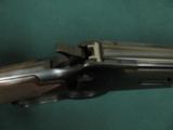 6199 Winchester 94 Legacy 30/30 24 inch barrel, semi buckhorn site, NEW IN BOX WITH ALL PAPERS, last made 2006. nice straight grain stock and forend,
- 12 of 12