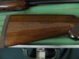 6238 Winchester 101 20 gauge,28 gauge, 410 gauge, skeet/skeet, 98++% with 3 barrel hard case, 28 inch barrels, very excellent condition,tiger striped- 12 of 12