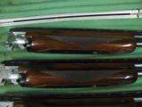 6238 Winchester 101 20 gauge,28 gauge, 410 gauge, skeet/skeet, 98++% with 3 barrel hard case, 28 inch barrels, very excellent condition,tiger striped- 10 of 12