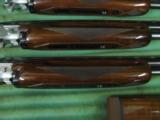 6238 Winchester 101 20 gauge,28 gauge, 410 gauge, skeet/skeet, 98++% with 3 barrel hard case, 28 inch barrels, very excellent condition,tiger striped- 11 of 12