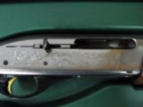 6251 Remington 1100 Premier Sporting 410 gauge 27 inch barrels, 5 chokes, extra pad, plug, 97-98% condition,silver receiver with GOLD CLAYS AND BANNER - 5 of 10