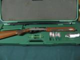 6251 Remington 1100 Premier Sporting 410 gauge 27 inch barrels, 5 chokes, extra pad, plug, 97-98% condition,silver receiver with GOLD CLAYS AND BANNER - 3 of 10