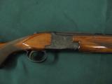 6292 Winchester 101 field 20 gauge 2 3/4 & 3 inch chambers, 26 inch barrel, skeet/skeet, pistol grip, sling swivels front red bead, Whiteline pad, 14
- 6 of 9