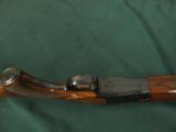 6292 Winchester 101 field 20 gauge 2 3/4 & 3 inch chambers, 26 inch barrel, skeet/skeet, pistol grip, sling swivels front red bead, Whiteline pad, 14
- 8 of 9