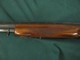 6292 Winchester 101 field 20 gauge 2 3/4 & 3 inch chambers, 26 inch barrel, skeet/skeet, pistol grip, sling swivels front red bead, Whiteline pad, 14
- 4 of 9