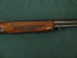 6292 Winchester 101 field 20 gauge 2 3/4 & 3 inch chambers, 26 inch barrel, skeet/skeet, pistol grip, sling swivels front red bead, Whiteline pad, 14
- 7 of 9