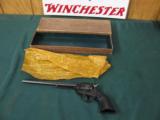 6315 Colt Single Action Buntline Scout 22 Long Rifle 9 1/2 inch barrel correct box and oil paper, black composite grips, no drag line, 99% condition,
- 1 of 12