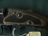 6379 WINCHESTER MODEL 21 DAISY BB GUN AS NEW IN BOX , 99% CONDITION WITH CORRECT BOX, GOLD SCROLL WORK AROUND SIDE PLATES AND FRAME. 2 BB LOADING TUBE - 10 of 16