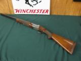 6348 Winchester 23 Pigeon XTR 12 gauge 26 inch barrels ic/mod,beavertail, single select trigger, ejectors vent rib, pad, 14 1/4 lop, rose and scroll c - 1 of 13