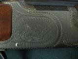 6372 Winchester 101 QUAIL SPECIAL 20 gauge 3 inch chambers, 25 inch barrel, STRAIGHT GRIP, all original, quail/dogs engraved on coin silver receiver,
- 13 of 13