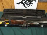 6399 Winchester 101 Pigeon 12 gauge 27 inch barrels, with 20, 28, 410, gauge tube set and 12 chokes and case. AA++Fancy Walnut. 12 Colonial chokes, 95 - 1 of 10