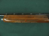 6517 Remington 1100 Lightweight 410 gauge 24 inch barrel mod fixed choke, vent rib, Remington butt plate, all original, light rust on loading tube und - 7 of 12