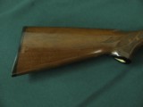 6517 Remington 1100 Lightweight 410 gauge 24 inch barrel mod fixed choke, vent rib, Remington butt plate, all original, light rust on loading tube und - 9 of 12