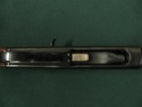 6517 Remington 1100 Lightweight 410 gauge 24 inch barrel mod fixed choke, vent rib, Remington butt plate, all original, light rust on loading tube und - 4 of 12
