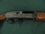 6517 Remington 1100 Lightweight 410 gauge 24 inch barrel mod fixed choke, vent rib, Remington butt plate, all original, light rust on loading tube und - 10 of 12