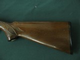 6517 Remington 1100 Lightweight 410 gauge 24 inch barrel mod fixed choke, vent rib, Remington butt plate, all original, light rust on loading tube und - 5 of 12