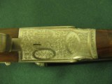 6524 Armis Garbi model 100 16 gauge 28 inch barrels ic/mod, straight grip, checkered butt, double triggers, ejectors, solid rib, rose/scroll detachabl - 10 of 12