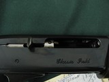 6516 Remington 1100 Classic Field 410 gauge, 2 barrels, 24 inch barrel and 26 inch barrel, skeet, ic and full screw in chokes and wrench. White diamon - 7 of 8