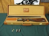 6555 Winchester
23 Golden Quail 20 gauge 26 inch barrels,ic/mod raised solid rib, ejectors, STRAIGHT GRIP,single selective trigger, quail/dogs engrav - 2 of 12