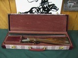 6558 Winchester 23 Grand Canadian 20 gauge 26 inch barrels,ic/mod, 3 inch chambers, STRAIGHT GRIP, raise relief gold maple leaves on bottom of receive - 1 of 13