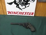 6561 Smith Wesson 27-3
357 revolver, adustable rear site, pachmayer grips, 8 inch barrel 98% condition. case colored hammer/trigger, white blade fron - 1 of 11