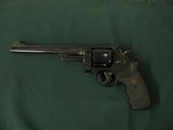 6561 Smith Wesson 27-3
357 revolver, adustable rear site, pachmayer grips, 8 inch barrel 98% condition. case colored hammer/trigger, white blade fron - 2 of 11