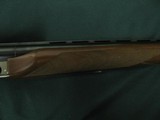 6570 Winchester 23 Pigeon XTR 20 gauge 26 inch barrels, 2 3/4 & 3 INCH CHAMBERS, 5 winchokes,s ic 2m full, wrench,round knob, Winchester butt pad, ALL - 13 of 13