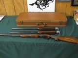 6583 Winchester 101 Field skeet set 28 inch barrels, 20 gauge 410 gauge 28 gauge, 28 inch barrels, 96%,RED W on pistol grip, Browning 3 barrel case, W - 1 of 15