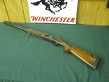6594 Winchester 101 PRESENTATION SKEET, 12 gauge 27 inch barrels, skeet/skeet, 4 GOLD RAISED RELIEF PHEASANTS ENGRAVED ON DARK BLUE RECEIvER WITH ROSE - 1 of 15