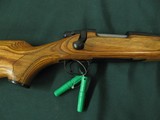 6600 Remington
Model 7 7MM short action ultra mag(SAUM)22 inch barrels, wood laminate composite stalk, butt pad, tools in green case, adjustable rear - 7 of 11