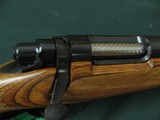 6600 Remington
Model 7 7MM short action ultra mag(SAUM)22 inch barrels, wood laminate composite stalk, butt pad, tools in green case, adjustable rear - 10 of 11