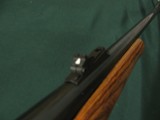 6600 Remington
Model 7 7MM short action ultra mag(SAUM)22 inch barrels, wood laminate composite stalk, butt pad, tools in green case, adjustable rear - 9 of 11