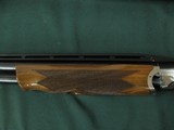 6608 Kreighoff K 80 Pro Sporter 12 gauge 32 inch barrels, adjustable comb and rib, lop 14 1/4,shot very little, tite, bores brite/shiny. comes with ca - 12 of 13