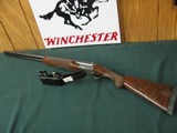 6610 Winchester 23 Pigeon XTR 12 gauge 28 inch barrels, 5 Briley chokes cyl, sk ic im f and wrench, 2 3/4 & 3 inch chambers, vent rib, single select t - 1 of 10