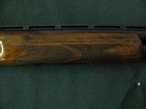 6617 Remington 3200 Competition12 GA Shotgun has serial #OU - 40919,1973 mfg, It is graded as"COMPETITION " 12 GA with 2 3/4" chamber - 9 of 12