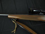 6669 Winchester model 70 Sporter 25-06 24 inch barrel,leather carry sling, Leupold 3x9 Vari-X-IIC scope,great combo in 99% condition.shot less than a - 4 of 9