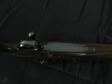 6671 Winchester model 70 22 hornet, 24 inch barrels, Redfield peep site, 2 side taps, steel butt plate,1938 mfg s/n1317x, bore brite/shiny - 12 of 13