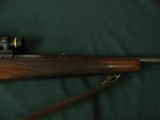 6672 Winchester model 70 300 H&H MAGNUM 26 inch barrel,steel butt. custom stock with cheek piece, leather sling Leupold 1.5 x 5 scope, excellent condi - 9 of 10