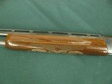 6789 Remington 1100 lightweight 28 gauge 24 inch barrels, mod fixed choke, vent rib, White Diamond in pistol grip cap, Remington butt plate, all origi - 4 of 10