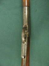 6797 Winchester 1886 45-70 26 inch barrel,blade front site, semi buckhorn elevator rear site, lever action, metal butt plate,all original, bore is ave - 17 of 18