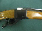 6832 Ruger #1 7x57 rifle,lever action, appears unfired, Ruger butt pad, nice grain walnut stock ,Mannlicher, V notch site, as new, 99% condition. - 8 of 12