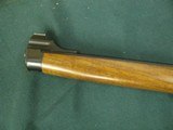 6832 Ruger #1 7x57 rifle,lever action, appears unfired, Ruger butt pad, nice grain walnut stock ,Mannlicher, V notch site, as new, 99% condition. - 5 of 12