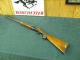6841 Winchester 101 field 28 gauge 28 inch barrels mod/full 3 inch chambers, ejectors, vent rib, pistol grip with cap, RED W FIRST 3 YEARS OF MFG.Pach - 1 of 11