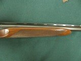 6858 Winchester 23 Pigeon XTR 20 gauge 28 inch barrels mod/full, beavertail, vent rib round knob ejectors, coins silver rose and scroll engraved recei - 12 of 13