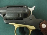 6883
MINT RUGER BEARCAT 22 caliber SINGLE ACTION 4" REVOLVER Serial number 90-18276. Brass trigger guard.
new condition with 100% original blue - 5 of 9