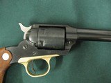 6883
MINT RUGER BEARCAT 22 caliber SINGLE ACTION 4" REVOLVER Serial number 90-18276. Brass trigger guard.
new condition with 100% original blue - 8 of 9