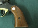 6883
MINT RUGER BEARCAT 22 caliber SINGLE ACTION 4" REVOLVER Serial number 90-18276. Brass trigger guard.
new condition with 100% original blue - 4 of 9